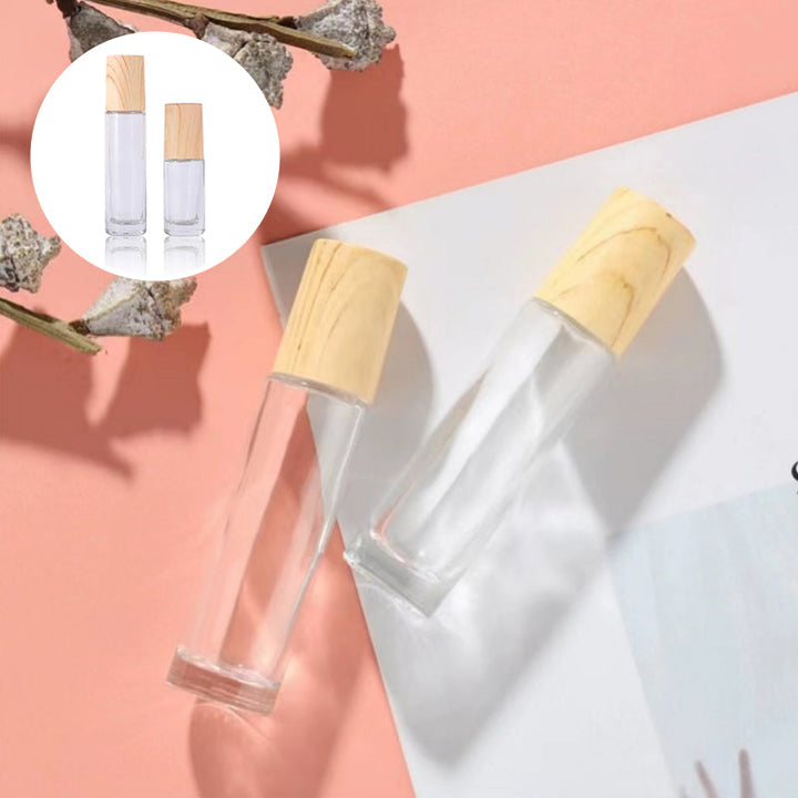 Five refillable clear glass essential oil roller bottles with stainless steel rollers, perfect for aromatherapy on the go