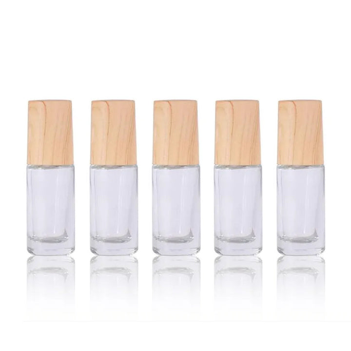 Set of 5 clear refillable essential oil roller bottles with stainless steel tips, great for serums and perfumes too