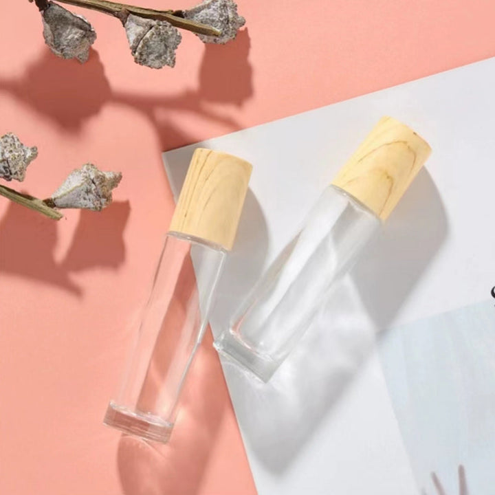 Essential oil roller bottles (5-pack) showing clear glass and durable stainless steel roller balls for long-lasting use