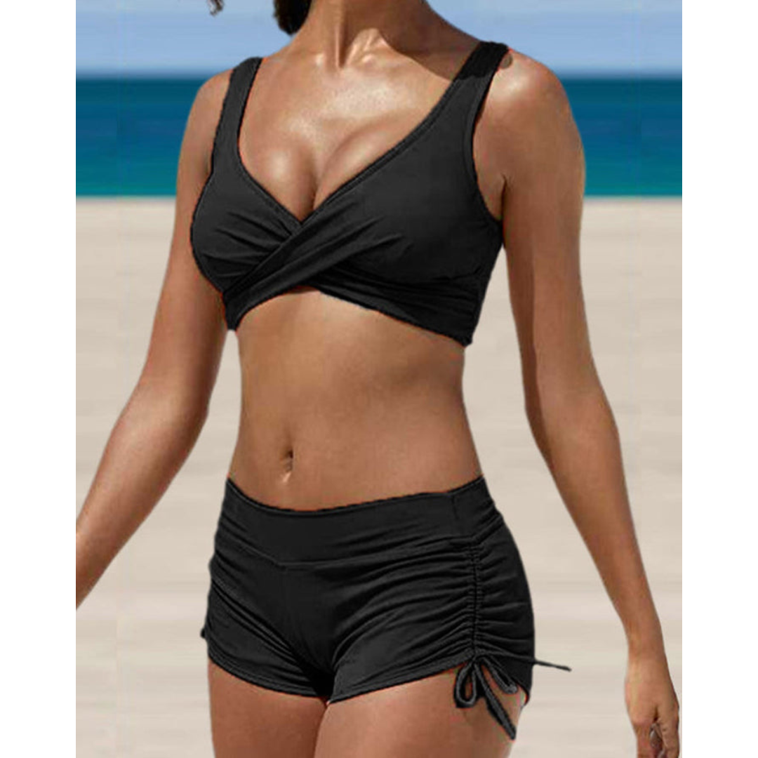 Flattering women's high-waist two-piece bikini swimsuit, offering tummy control and stylish beachwear for summer.