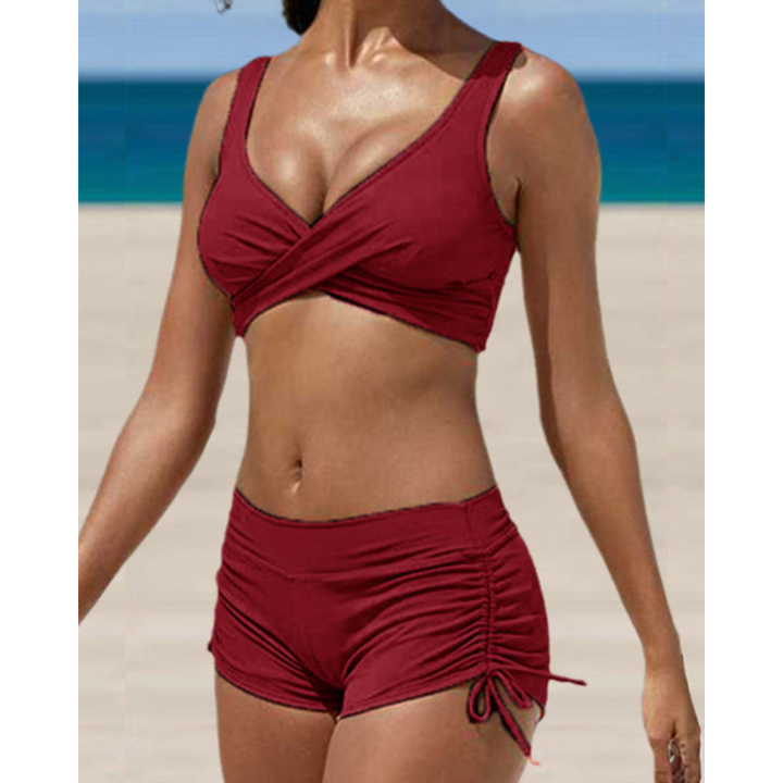 Comfortable women's high-waist two-piece bikini with adjustable straps and quick-dry fabric, ideal for vacation.