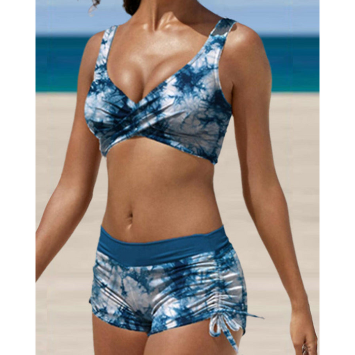 Stylish women's high-waist two-piece swimsuit. Perfect for beach vacations, offering flattering summer fashion.