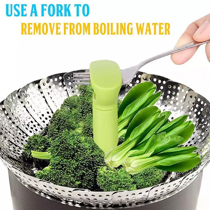 Flower-shaped steamer basket in use, steaming fresh vegetables for a healthy meal, stainless steel cookware