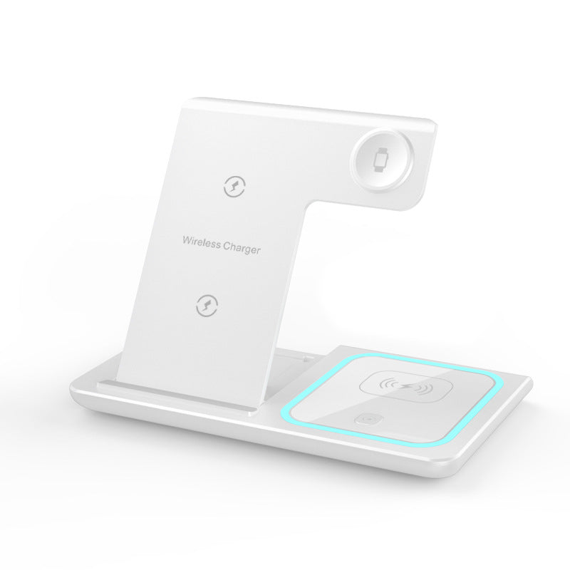 Lifestyle image of the 3-in-1 wireless charger on a bedside table, powering a phone and watch