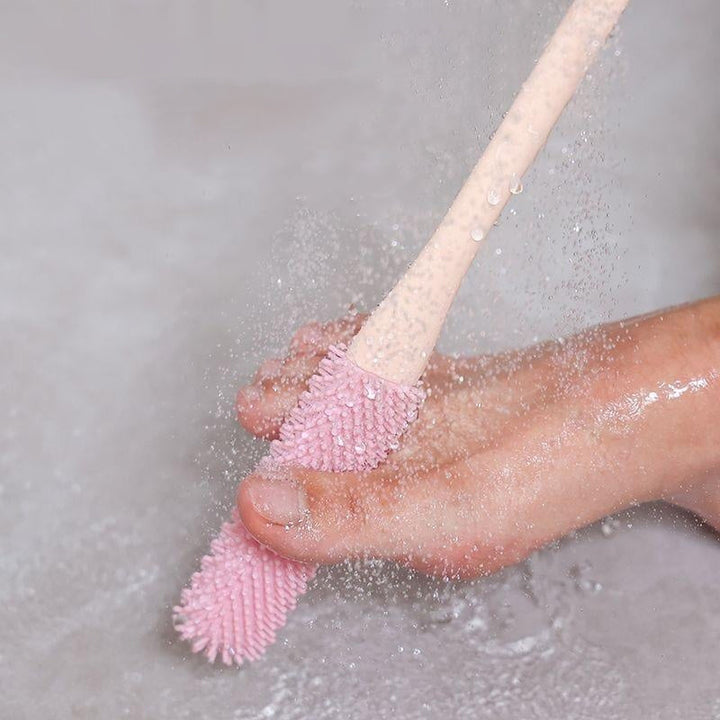 Textured handle of the foot cleaning brush, ensuring a secure grip even when wet