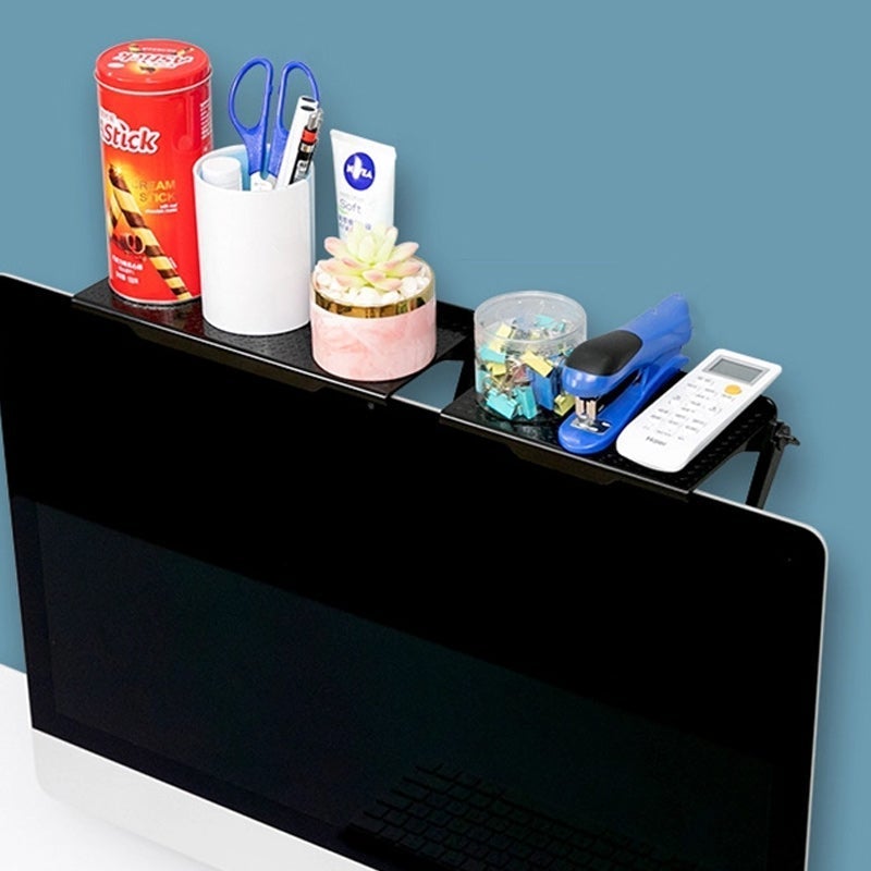 Close-up of foldable Universal Monitor Top Shelf Organizer on desk, showing textured ABS plastic surface.