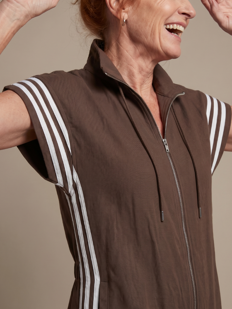 Women's full-length fashion jumpsuit, side stripe, zip front, cap sleeve, high neck design.