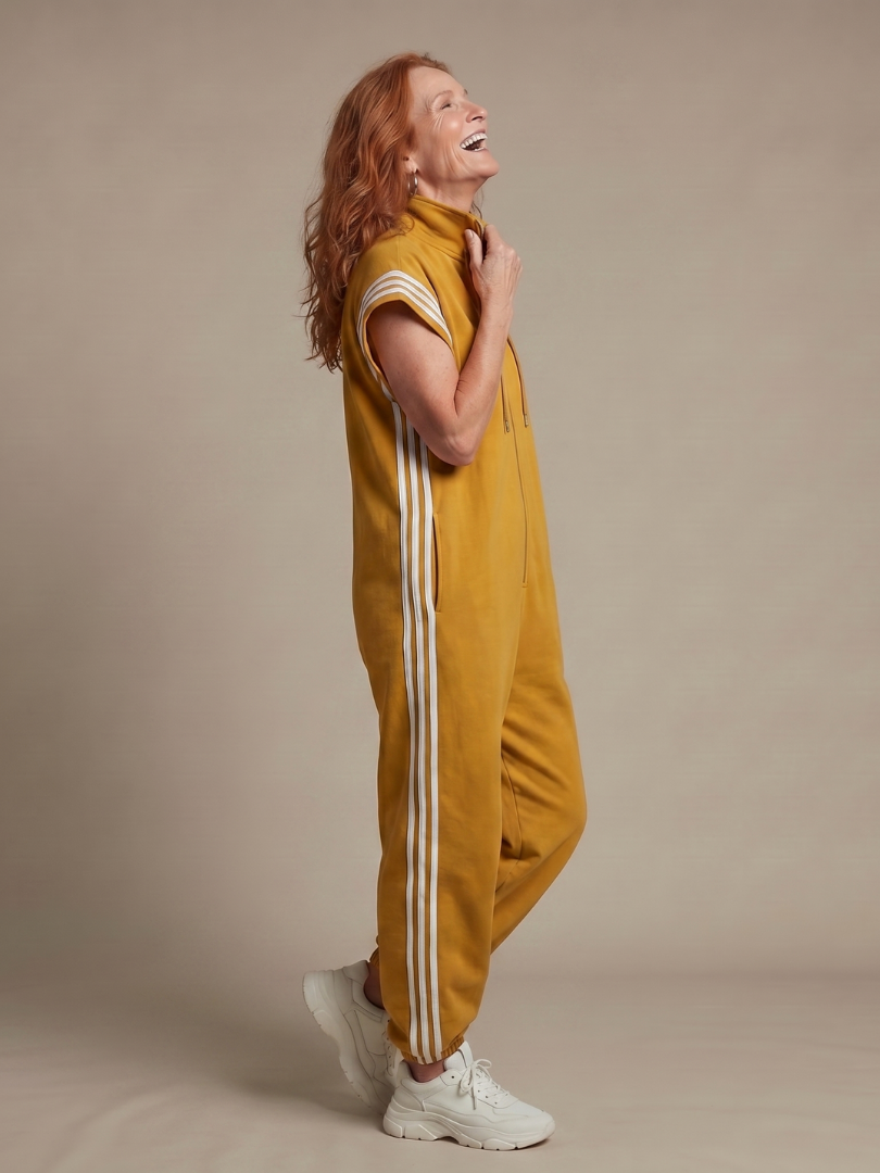 Sporty women's full-length jumpsuit, zip front, side stripe detail, perfect for casual wear.