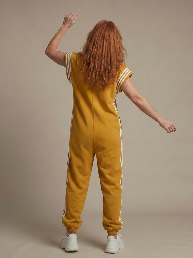 Chic women's full-length jumpsuit, zip front, high neck, cap sleeve, athletic side stripe.