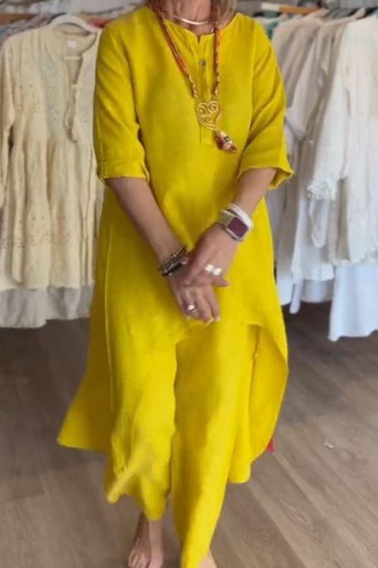 Flat lay of women's chic outfit set with elegant accessories, a complete comfortable daily wear ensemble.