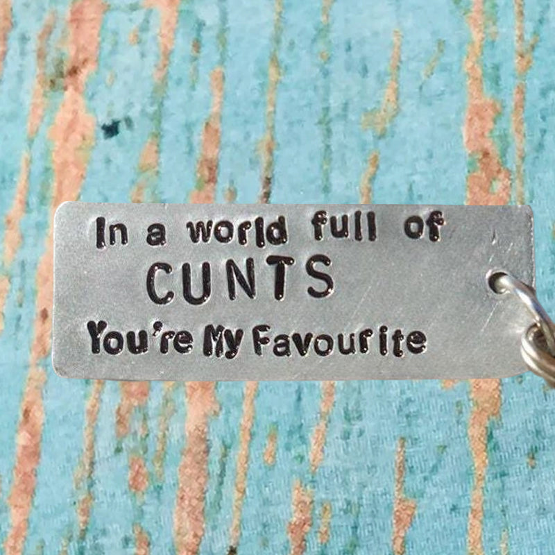 Christmas gag gift keychain, funny and lighthearted, stainless steel accessory