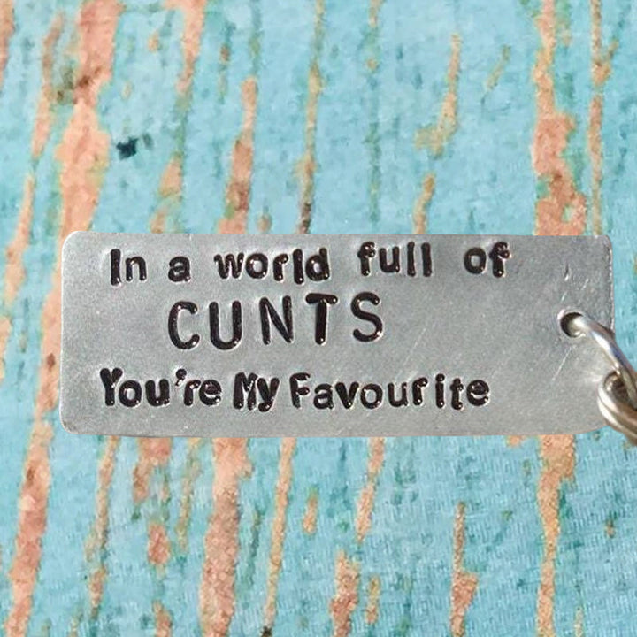 Christmas gag gift keychain, funny and lighthearted, stainless steel accessory