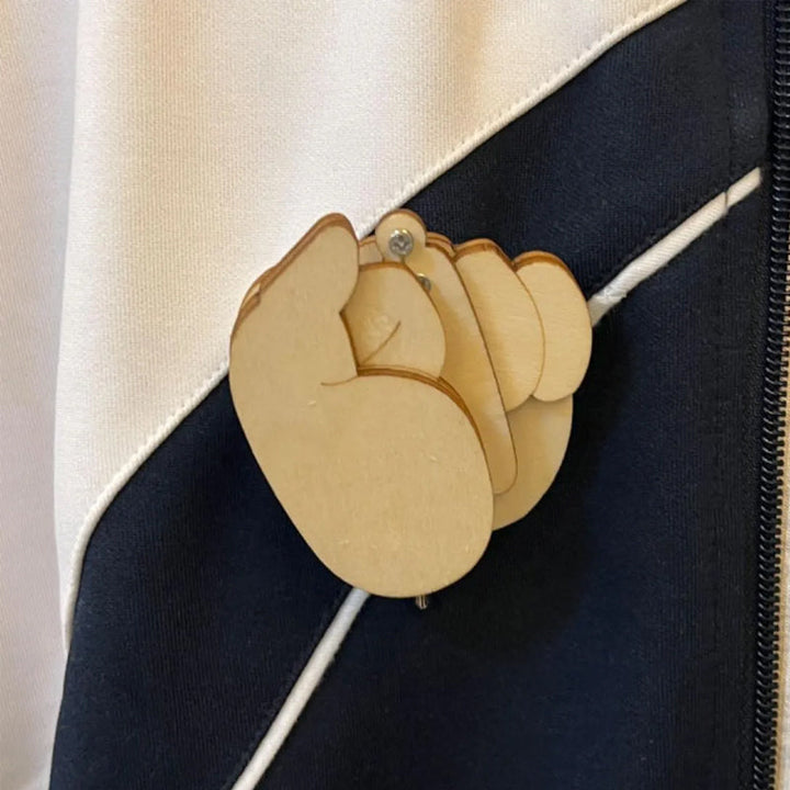Wooden flippable middle finger brooch, a humorous accessory and gag gift for adults, novelty pin.