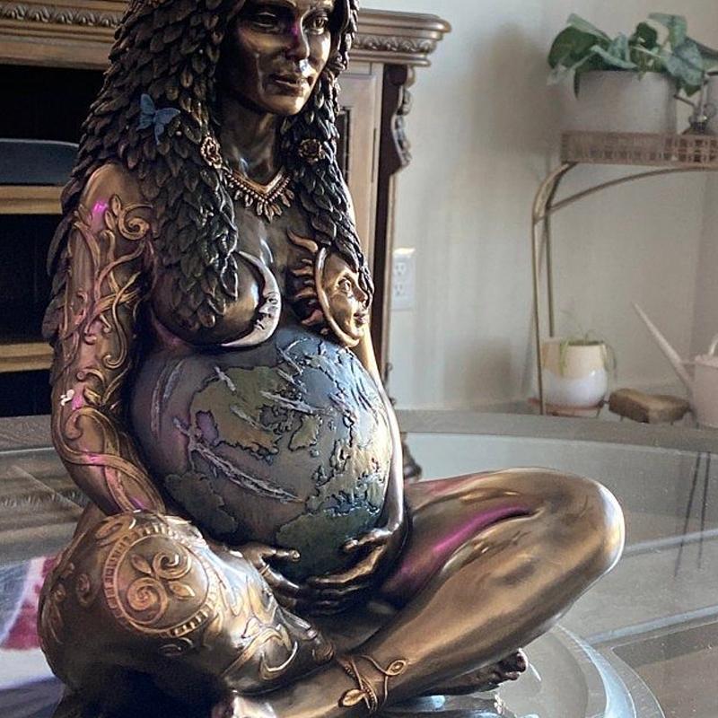 Close-up of Gaia Mother Earth figurine, intricate Celtic mythology details, perfect for spiritual decor