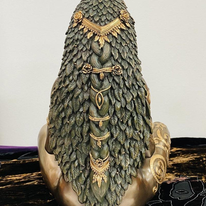 Resin Gaia Earth Mother figurine with flowing hair and botanicals, ideal for nature-inspired home decor