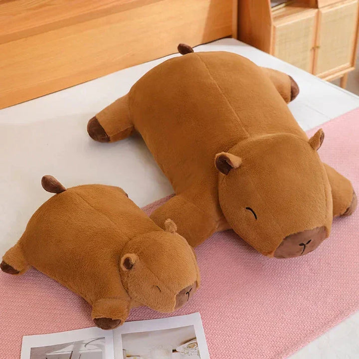 Soft & cuddly giant capybara plush, an adorable stress relief toy. Perfect for comfort and snuggles.
