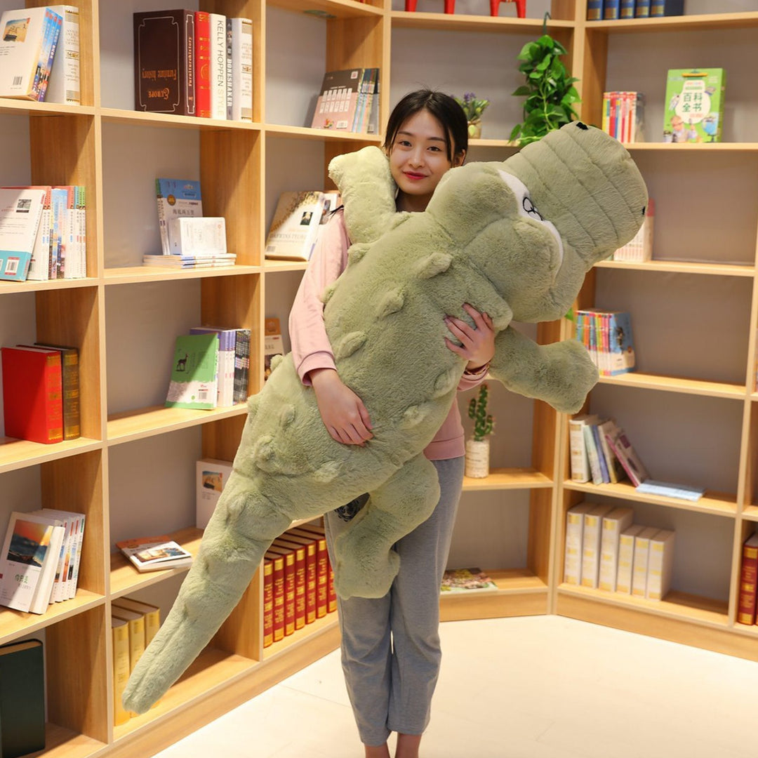 Giant crocodile plush pillow, soft & huggable companion. Perfect for kids & adults, an oversized stuffed animal.