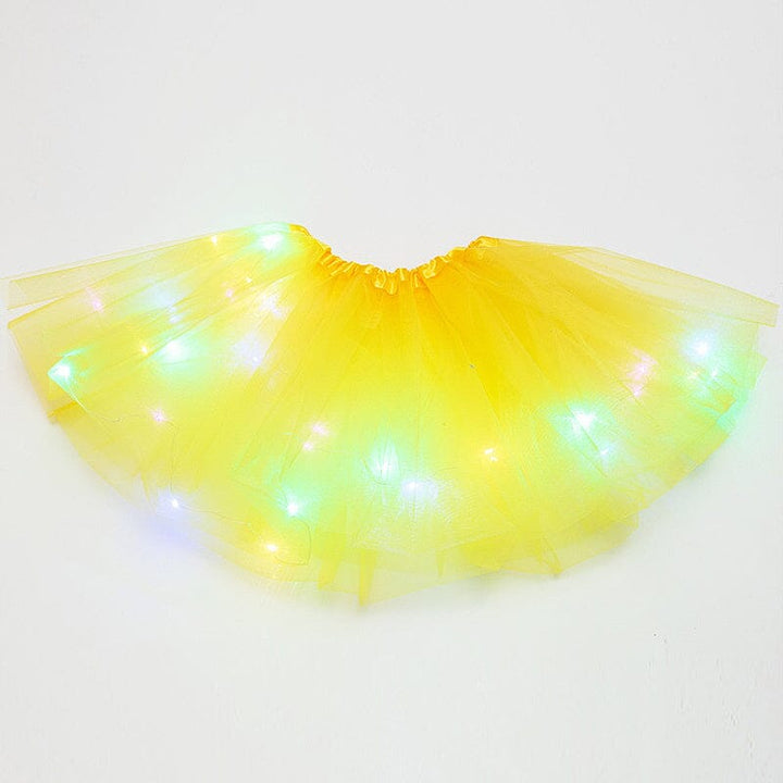 Side view of a womens' blue LED tutu skirt, flowing fabric with vibrant lights, party wear