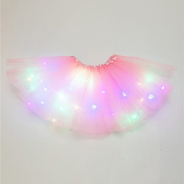Close-up of a vibrant LED tutu skirt's layers, showing glowing lights through the tulle fabric