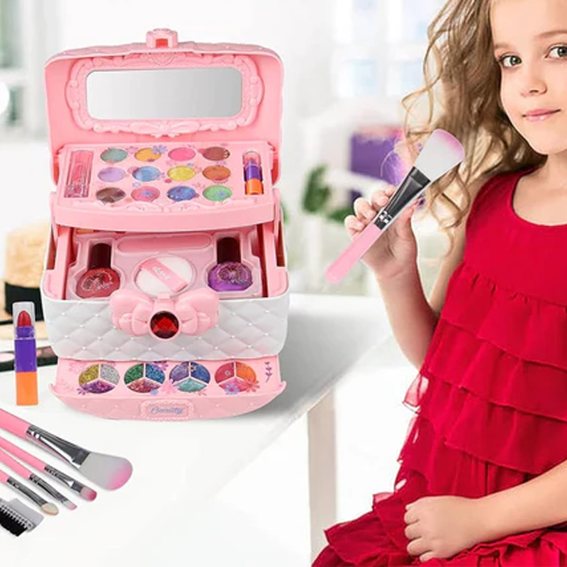 A child's hands applying play eyeshadow from a washable makeup kit, fun educational toy