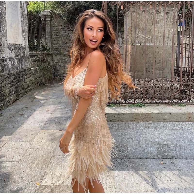 Stunning women's feather mini dress. A sleeveless, pull-over design, perfect for glamorous evening parties.
