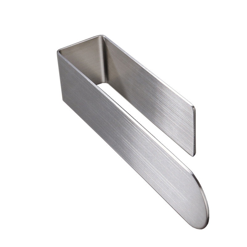 Adhesive gold stainless steel towel bar, ideal for modern kitchen organization.