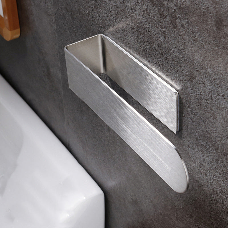 Silver adhesive stainless steel towel rack, versatile for bathroom and kitchen.