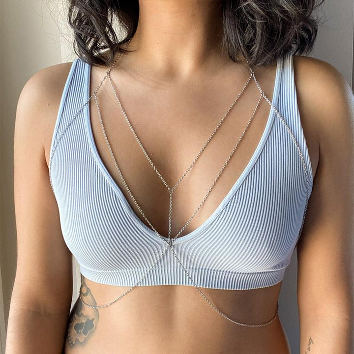 Women's gold body jewelry with delicate chains, ideal for special occasions