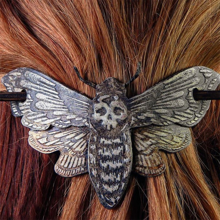Halloween themed hair pin, featuring a detailed gothic moth and faux bone, a statement metal accessory for women.
