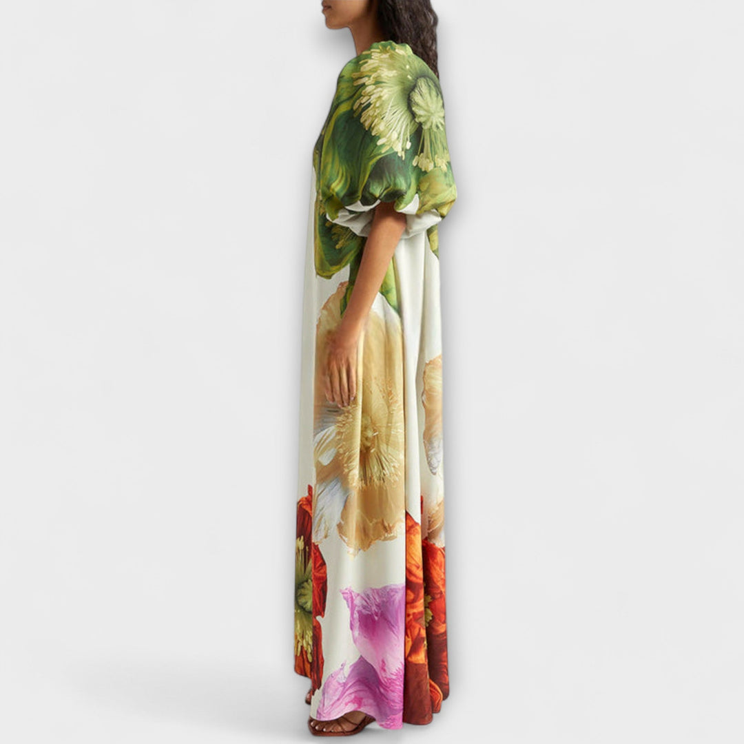 Vibrant green floral maxi dress for women with a flattering asymmetrical neckline, ideal for elegant summer events.