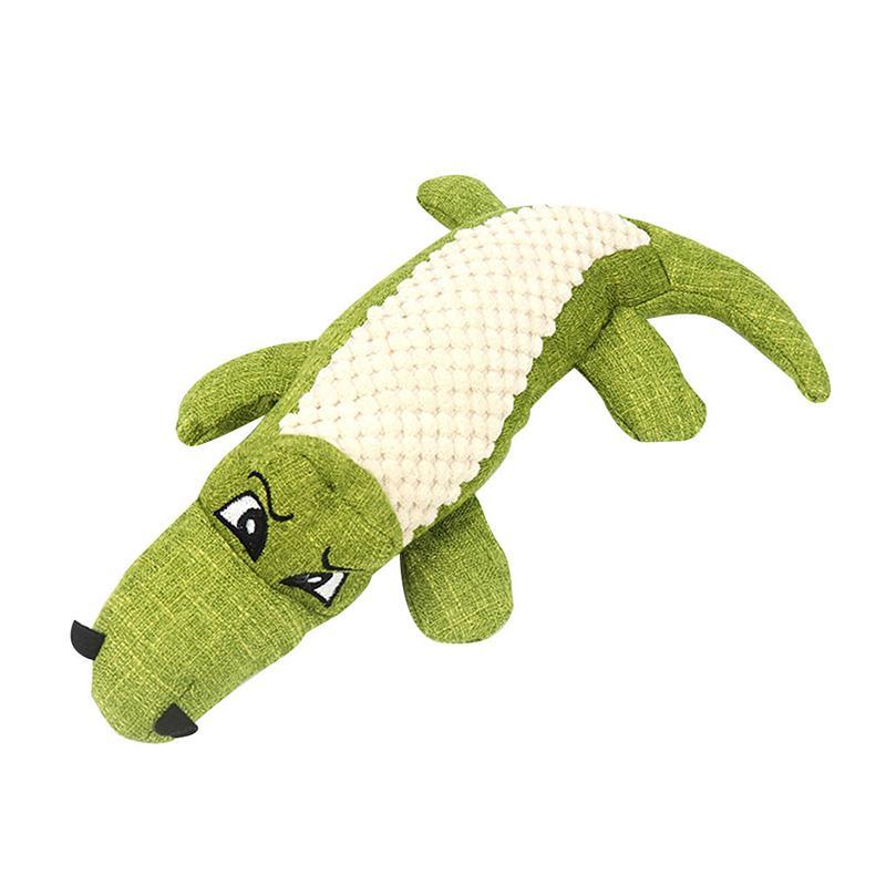 Action shot of a dog mid-air, catching the Pet Crocodile Squeaking Chew Toy, dynamic pet supplies