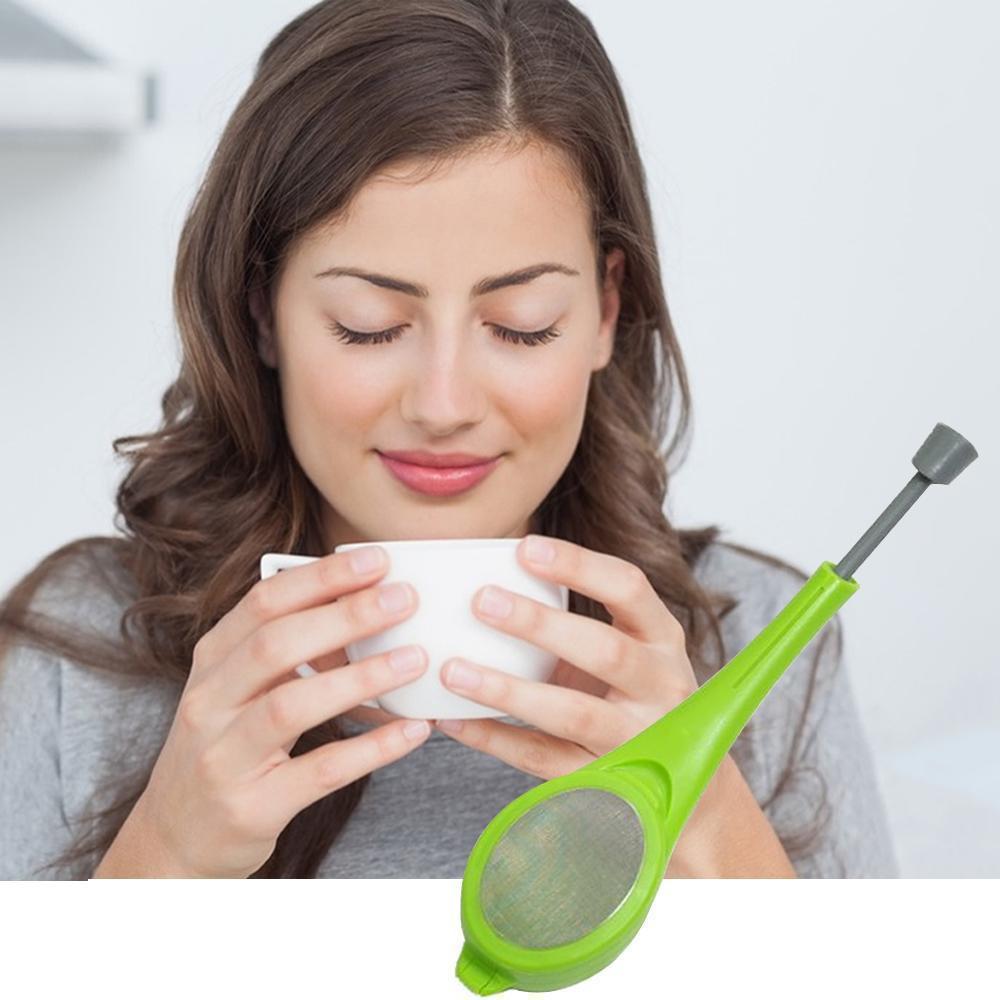 Green tea infuser spoon, sleek design, for loose leaf tea; convenient & durable tea brewer.