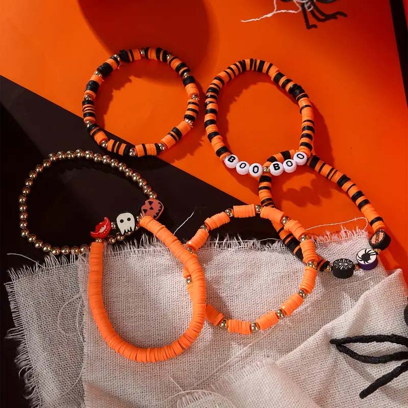 Vibrant orange pumpkin charm prominently displayed on a unisex Halloween bracelet.