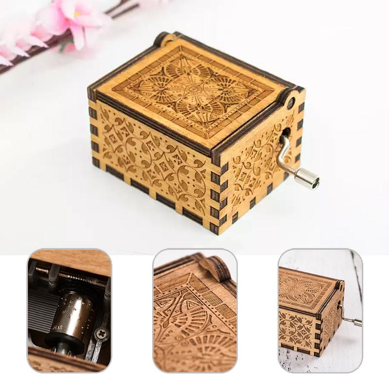 Hand-cranked wooden music box with intricate carvings, playing a sweet melody, perfect gift