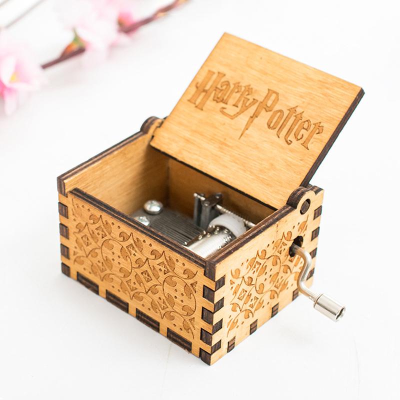 Musical wooden box, featuring a charming design and a smooth hand crank for beautiful melodies
