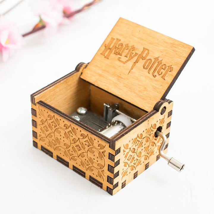 Musical wooden box, featuring a charming design and a smooth hand crank for beautiful melodies