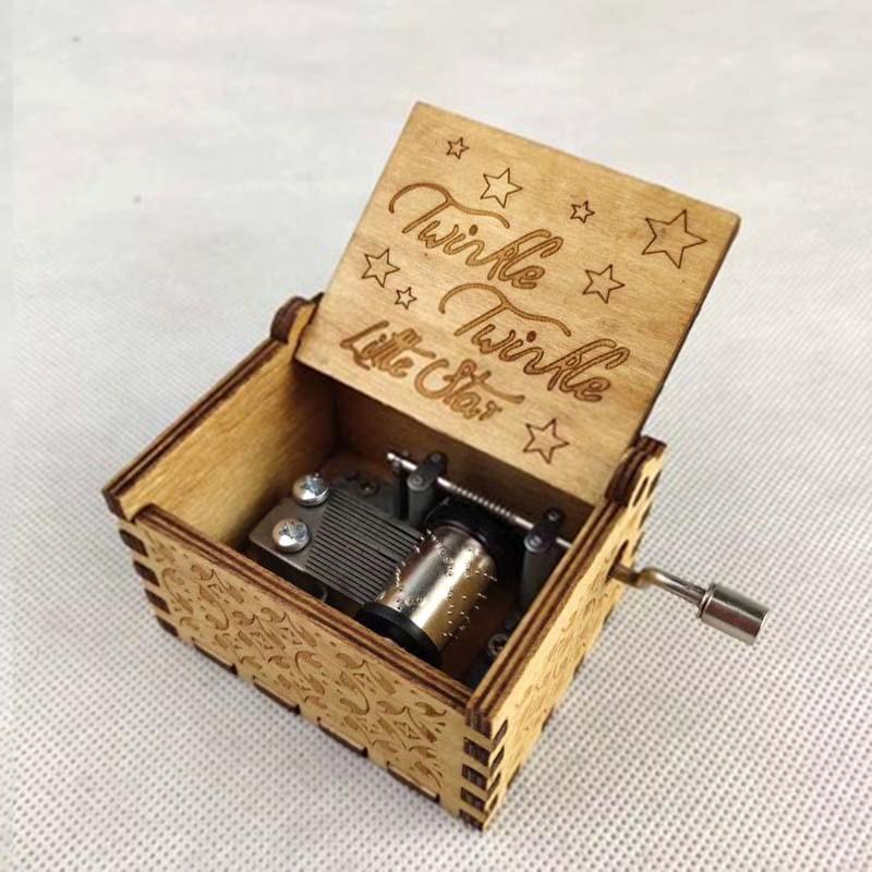 Ornate wooden music box playing a gentle melody, a perfect handmade gift for music lovers