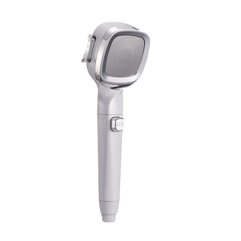 Compact handheld shower head with a robust build, offering pressurized water and a unique pause switch.