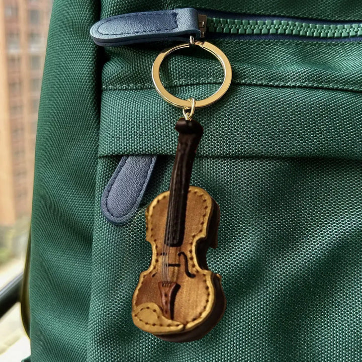 Compact leather musical instrument keychain, suitable for bags, keys, or accessories