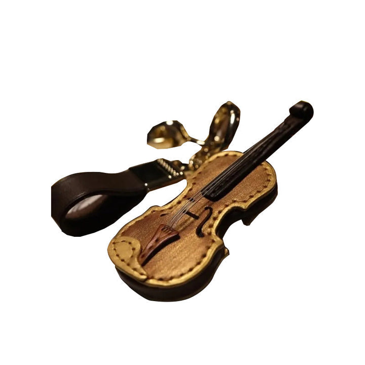 Hand-stitched leather cello keychain, celebrating the beauty of musical instruments
