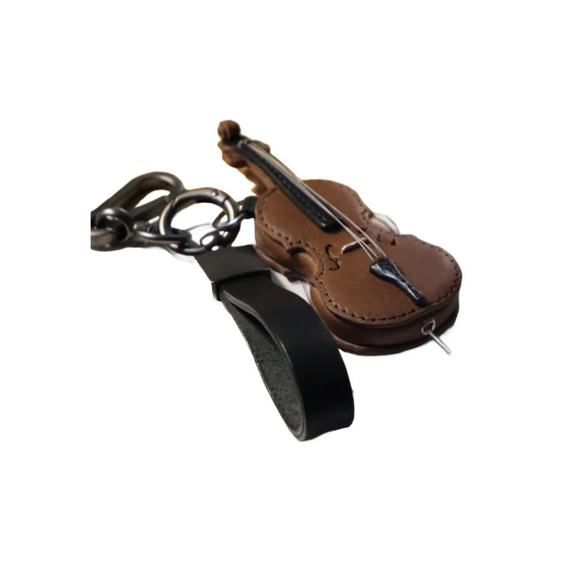 Elegant leather musical instrument keychain, combining style with a love for music