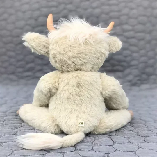 Unique handmade Scottish Highland cow plush toy. Soft alpaca fur, brown, with authentic moo sound. Great home decor.