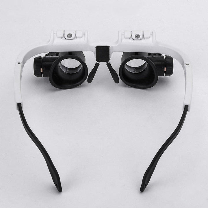 Adjustable hands-free optical aid with LED light. Powerful 8x, 15x, 23x magnifying lenses for detailed hobby supplies.