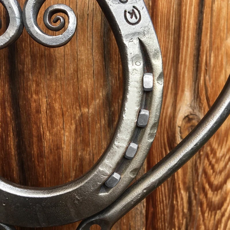 Romantic heart-shaped metal art wind chime, ideal for enhancing outdoor decor with soft melodies.