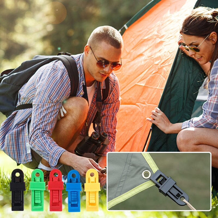 Heavy duty black tarp clips, essential outdoor gear for securing shelters & tents.