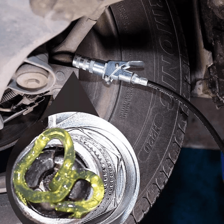 Heavy-duty industrial quick-lock grease gun coupler for efficient lubrication in workshops