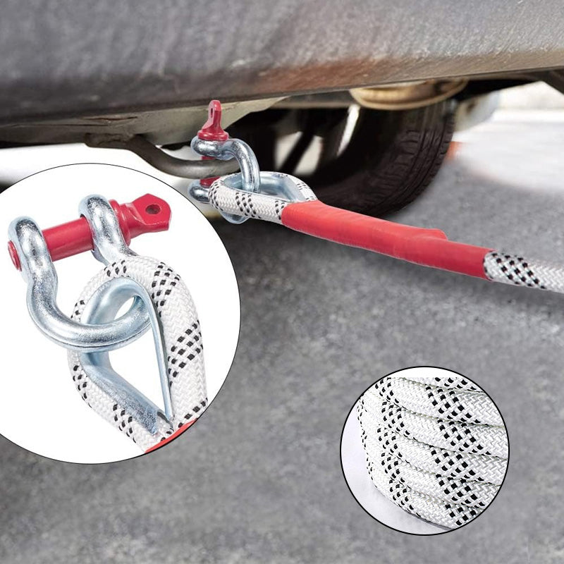 Kinetic tow rope attached to a recovery point on an off-road truck during an exercise