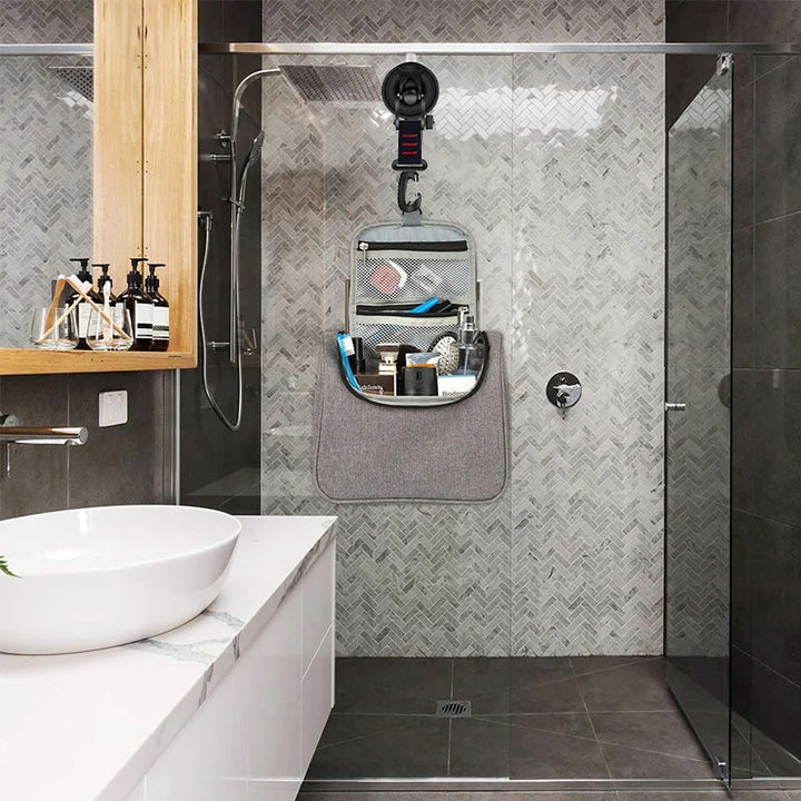 Powerful vacuum suction cup hook securing items for home organization and travel accessory use.