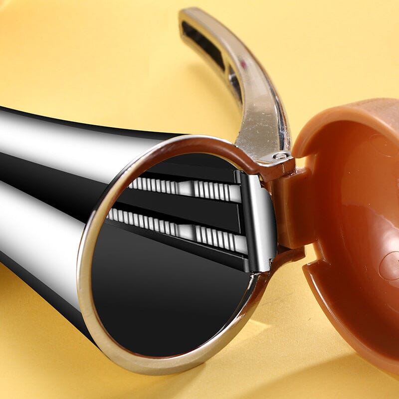 Kitchen nut tool: Universal nutcracker in polished zinc alloy, designed for efficient nut shelling