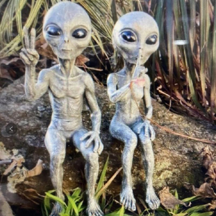 Humorous alien garden statue, perfect for outdoor decor, made from durable resin material